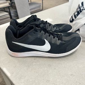 Like new Nike track shoes for spikes. Size 6 .. my son wore these 1 season.